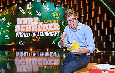 Herr Schröder live! - World Of Lehrkraft